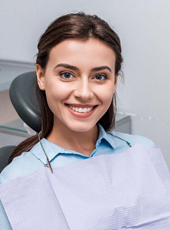 Woman seeing Cigna dentist in Houston