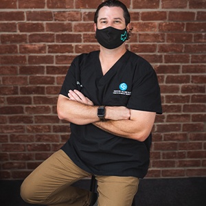 doctor in mask with crossed arms