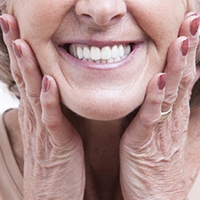 An up-close view of a person’s smile after receiving dental implants in Houston