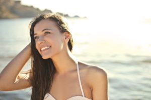 Woman with an attractive smile at beach